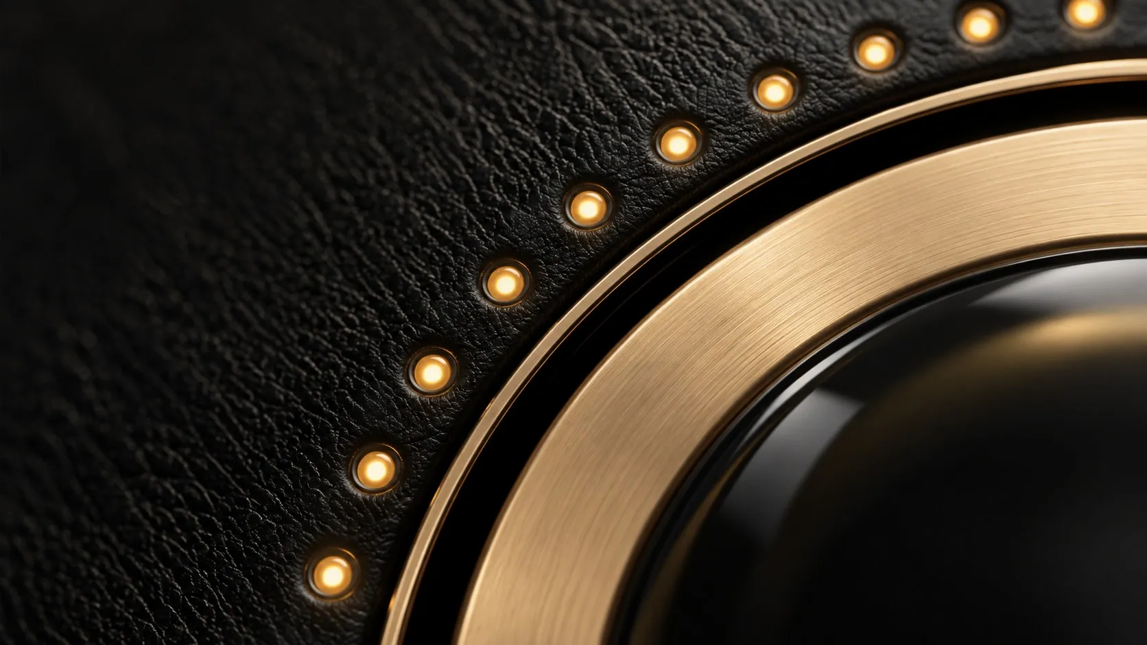 Macro render of the brushed gold dial ring, black glass and warm indicator lights